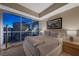 Serene bedroom offering city views from a large window at 2700 Las Vegas Blvd # 809, Las Vegas, NV 89109