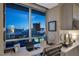 Home office with city views at night, and a large window at 2700 Las Vegas Blvd # 809, Las Vegas, NV 89109