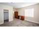 Spacious bedroom with built-in desk and closet at 272 Arbour Garden Ave, Las Vegas, NV 89148