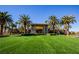 Community center with palm trees and lush landscaping at 272 Arbour Garden Ave, Las Vegas, NV 89148