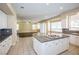 Large kitchen with granite countertops and white cabinets at 272 Arbour Garden Ave, Las Vegas, NV 89148