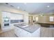 Kitchen with granite island, white cabinets, and gas cooktop at 272 Arbour Garden Ave, Las Vegas, NV 89148