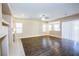 Bright living room with wood-look floors and a fireplace at 272 Arbour Garden Ave, Las Vegas, NV 89148