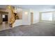 Two-story living room with hardwood floors and staircase at 272 Arbour Garden Ave, Las Vegas, NV 89148