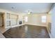 Large living room featuring a fireplace and wood-look flooring at 272 Arbour Garden Ave, Las Vegas, NV 89148