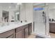 Elegant bathroom with double vanity and shower at 320 Via Del Duomo, Henderson, NV 89011