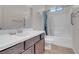 Clean bathroom with tub and shower at 320 Via Del Duomo, Henderson, NV 89011