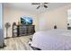 Bright bedroom with large TV and ample storage at 320 Via Del Duomo, Henderson, NV 89011