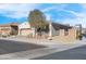 Single story house with a two car garage and desert landscaping at 320 Via Del Duomo, Henderson, NV 89011