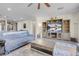 Comfortable living room featuring built-in shelving and large TV at 320 Via Del Duomo, Henderson, NV 89011