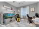 Bright home office featuring a large aquarium and comfortable seating at 320 Via Del Duomo, Henderson, NV 89011