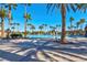 Resort-style pool with palm trees and seating at 320 Via Del Duomo, Henderson, NV 89011