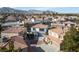 Beautiful aerial view of homes in a well-maintained neighborhood with mountain views at 3335 Cheltenham St, Las Vegas, NV 89129