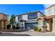 Charming two-story home with desert landscaping, a gray color scheme, and a two-car garage at 3335 Cheltenham St, Las Vegas, NV 89129