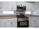 This modern kitchen features stainless-steel appliances and granite countertops at 3335 Cheltenham St, Las Vegas, NV 89129