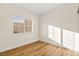 Well-lit bedroom with hardwood floors and window with blinds at 3400 Cabana Dr # 1108, Las Vegas, NV 89122