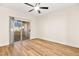 Bedroom with wood-look floors and sliding patio doors at 3400 Cabana Dr # 1108, Las Vegas, NV 89122