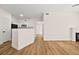 Living room with fireplace and laminate wood floors at 3400 Cabana Dr # 1108, Las Vegas, NV 89122