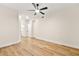 Light-filled living room featuring hardwood floors and ceiling fan at 3400 Cabana Dr # 1108, Las Vegas, NV 89122