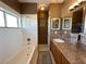 Clean bathroom with a bathtub, shower, and granite countertops at 3550 Bay Sands Dr # 3073, Laughlin, NV 89029