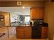 Kitchen with breakfast bar and views to living room at 3550 Bay Sands Dr # 3073, Laughlin, NV 89029