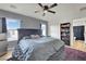 Round bed in spacious bedroom with a large TV and dresser at 4151 San Cuervo Way, Las Vegas, NV 89115