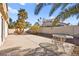 Relaxing backyard patio with table and chairs at 433 Old Palms Dr, Las Vegas, NV 89123