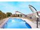 Relaxing swimming pool and patio area in the backyard at 4417 Socrates St, North Las Vegas, NV 89031