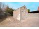 Wooden storage shed in the backyard provides extra storage at 4417 Socrates St, North Las Vegas, NV 89031