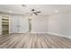 Spacious bedroom with wood-look floors and walk-in closet at 491 Kristin Ln, Henderson, NV 89011