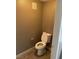 Small half bathroom with toilet at 50 Aura De Blanco St # 13103, Henderson, NV 89074