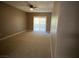 Bright bedroom featuring sliding glass doors opening to outdoor space at 50 Aura De Blanco St # 13103, Henderson, NV 89074