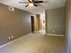 Spacious carpeted bedroom with ceiling fan at 50 Aura De Blanco St # 13103, Henderson, NV 89074