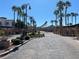 Gated community entrance with fountain and palm trees at 50 Aura De Blanco St # 13103, Henderson, NV 89074