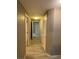 Bright hallway with doors to bedrooms and bathrooms at 50 Aura De Blanco St # 13103, Henderson, NV 89074