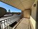 Private balcony with metal railing and views of the community at 5181 River Glen Dr # 172, Las Vegas, NV 89103