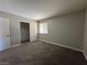 Spacious carpeted bedroom with double door closet and window at 5181 River Glen Dr # 172, Las Vegas, NV 89103