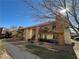 Two-story building with balconies and landscaping at 5181 River Glen Dr # 172, Las Vegas, NV 89103