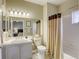 Clean bathroom with shower/tub combo and updated vanity at 5250 S Rainbow Blvd # 2032, Las Vegas, NV 89118