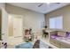 bedroom with a daybed, desk, and toy storage at 5250 S Rainbow Blvd # 2032, Las Vegas, NV 89118