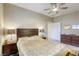 Spacious bedroom with ceiling fan and ample closet space at 5250 S Rainbow Blvd # 2032, Las Vegas, NV 89118