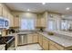 Spacious kitchen featuring granite countertops and stainless steel appliances at 5250 S Rainbow Blvd # 2032, Las Vegas, NV 89118