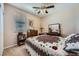 Cozy bedroom with a vintage dresser and patchwork quilt at 5442 Bristol Bend Ct, Las Vegas, NV 89135