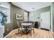 Small dining area with round table and chairs, near entryway at 5442 Bristol Bend Ct, Las Vegas, NV 89135