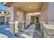 Covered entryway with stone columns and walkway at 5442 Bristol Bend Ct, Las Vegas, NV 89135