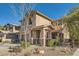 Two-story house with stone accents and landscaping at 5442 Bristol Bend Ct, Las Vegas, NV 89135