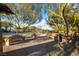 Relaxing pathway with benches under trees at 5442 Bristol Bend Ct, Las Vegas, NV 89135