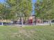 Community playground with covered play area and benches at 5442 Bristol Bend Ct, Las Vegas, NV 89135