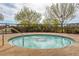 Relax in this community spa with circular design at 5442 Bristol Bend Ct, Las Vegas, NV 89135