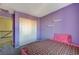 Bright bedroom with a double bed and closet at 6201 Ashley Hills Ave, Las Vegas, NV 89141